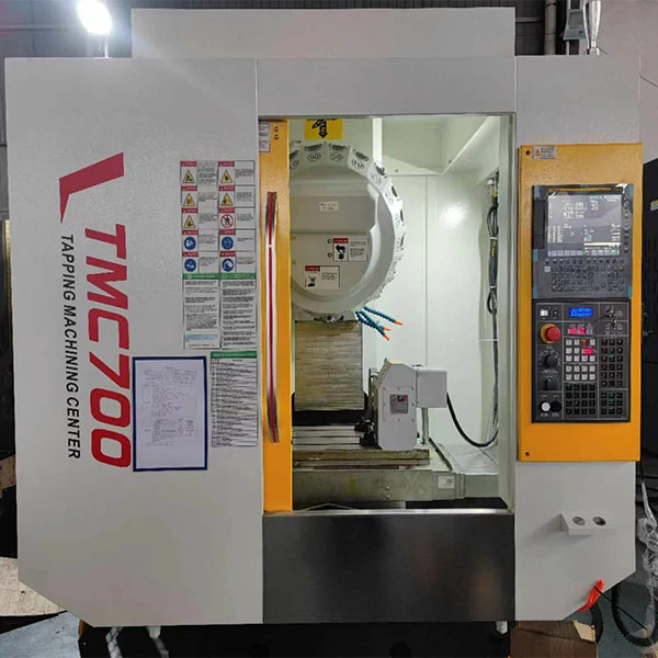 cnc-tapping-center-front-view CNC tapping center front view with full enclosure for precision machining of small components