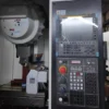 cnc-tapping-center-machining-area-control-system CNC tapping center machining area and control system showing spindle workspace and operation interface