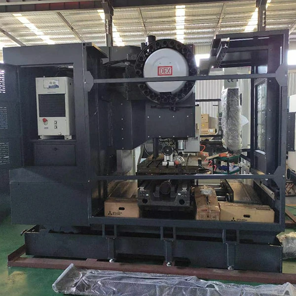 heavy-duty-cnc-machining-center-rear-view Rear view of heavy duty CNC machining center showing machine structure and auxiliary systems