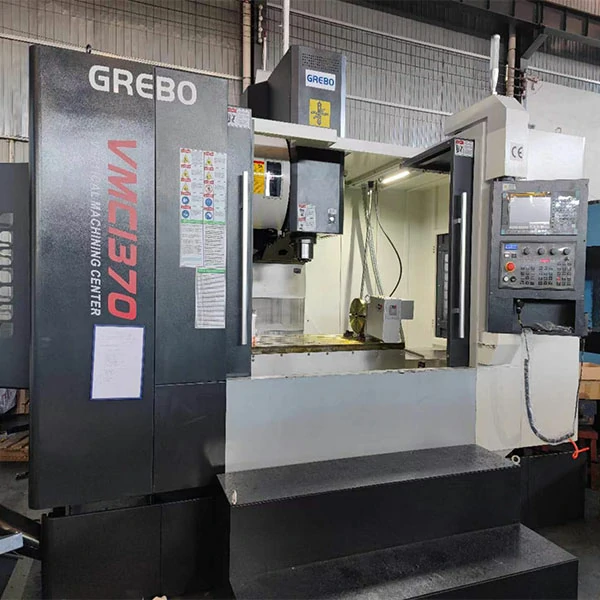 heavy-duty-cnc-machining-center-side-view Side view of heavy duty CNC machining center showing rigid frame and large machine structure