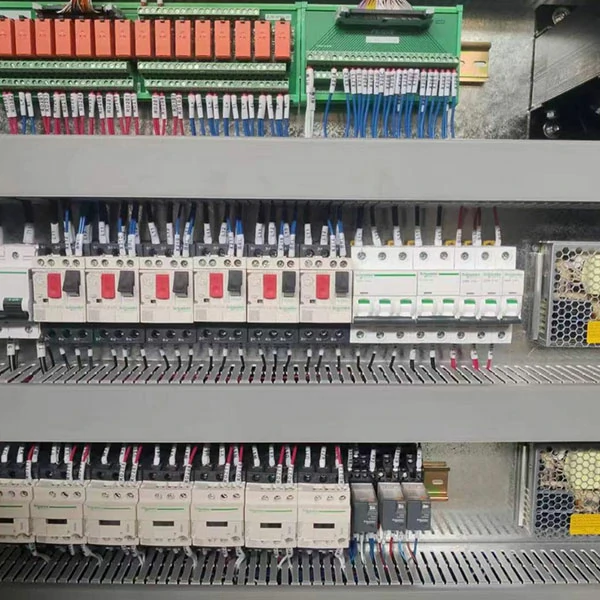 high-speed-machining-center-electrical-cabinet Electrical cabinet interior of high-speed machining center with CNC control components and wiring system