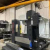 large-cnc-machining-center-right-side-view Right side view of large CNC machining center showing extended machine structure and working area