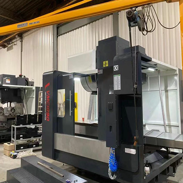 large-cnc-machining-center-right-side-view Right side view of large CNC machining center showing extended machine structure and working area