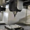 large-gantry-machining-center-heavy-cutting-operation Large gantry machining center performing heavy cutting operation on a large workpiece