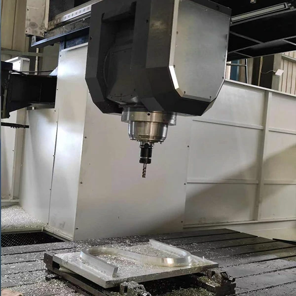 large-gantry-machining-center-heavy-cutting-operation Large gantry machining center performing heavy cutting operation on a large workpiece