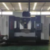 large-vertical-machining-center-factory-view Large vertical machining center in factory workshop for machining large components and molds