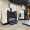 large-vertical-machining-center-workshop-installation Large vertical machining centers installed in factory workshop for precision machining production