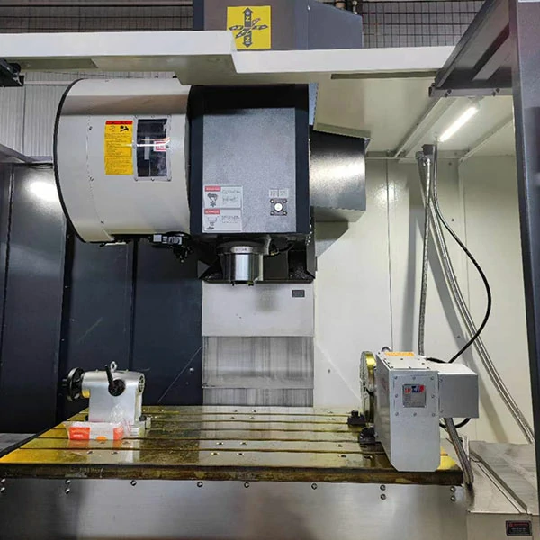 X-axis travel for mold machining on vertical machining center